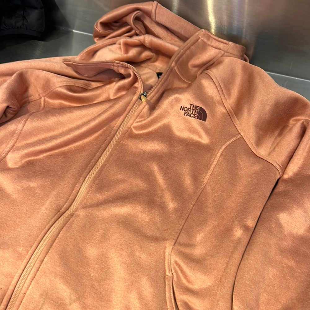 The north face women’s pink fleece jacket